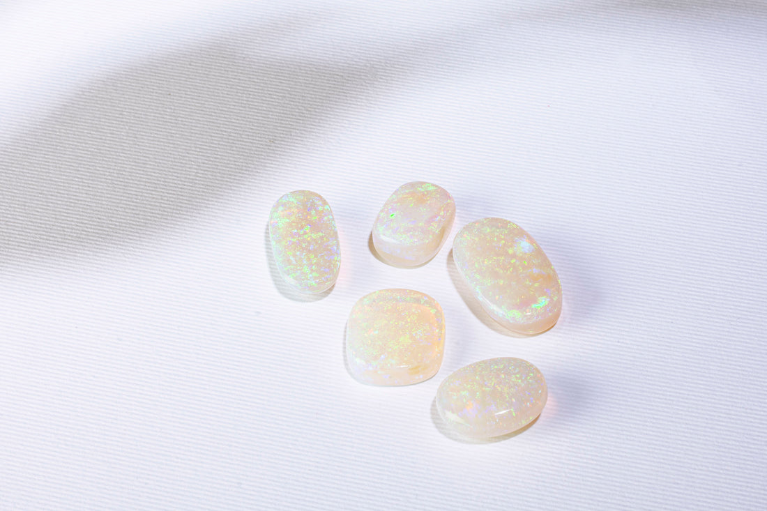 cut and polished opal gems with play of colour effect