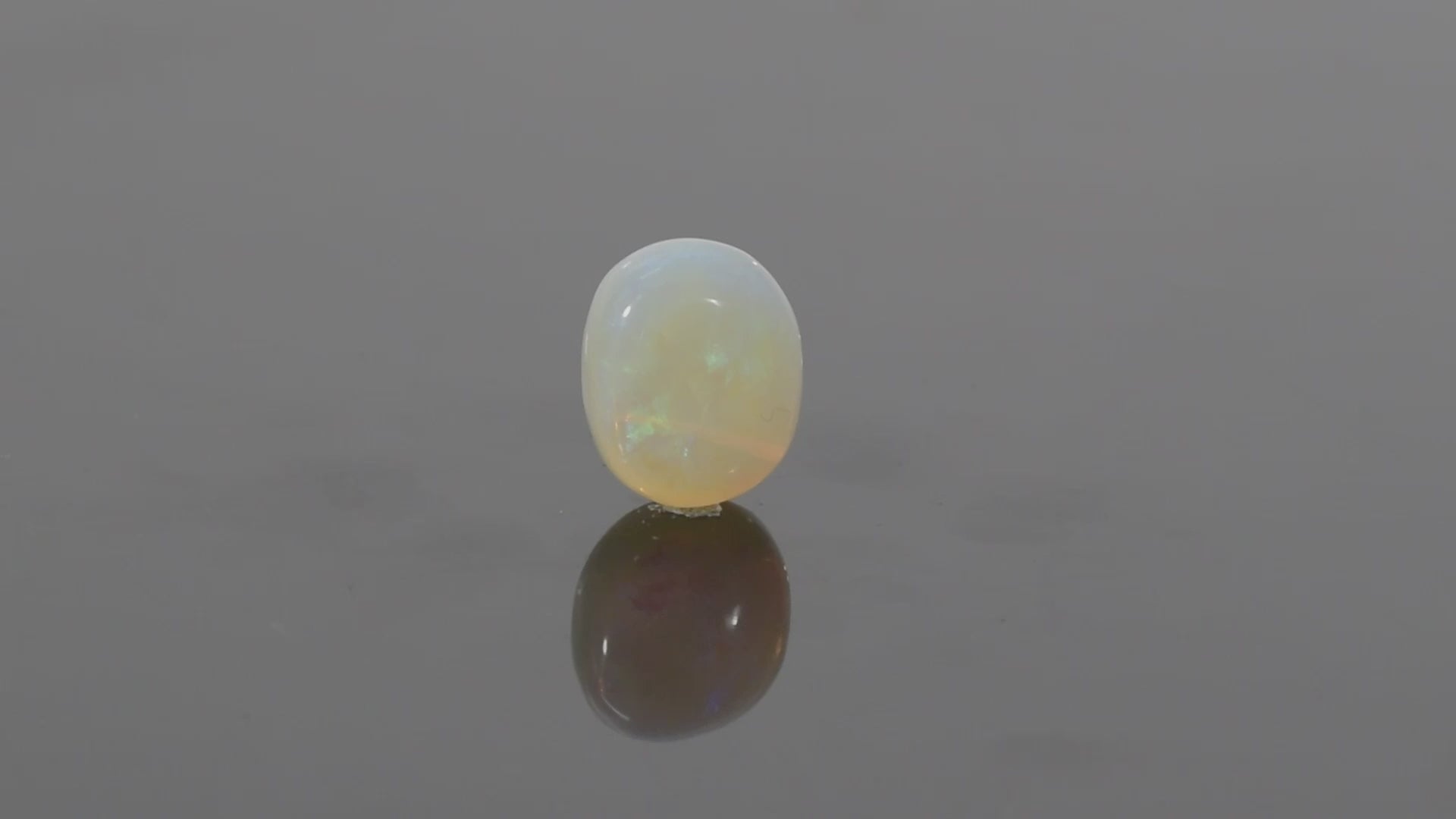 Australian White Opal With Fire - 12.70 Carats