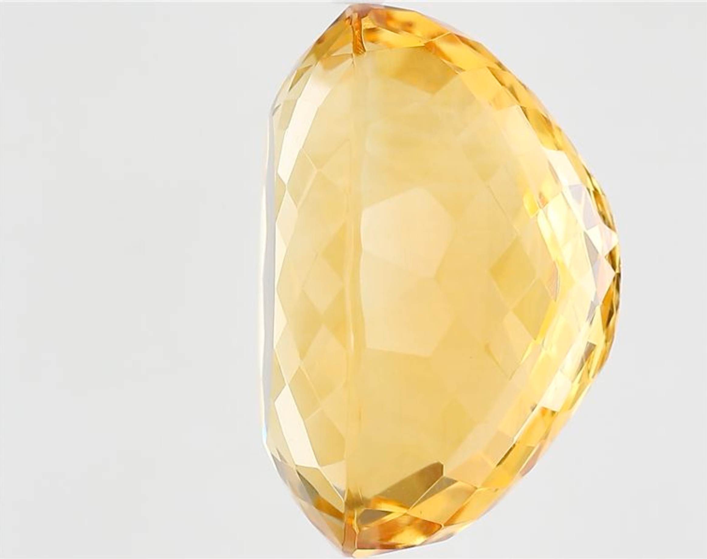 side-view of a faceted citrine