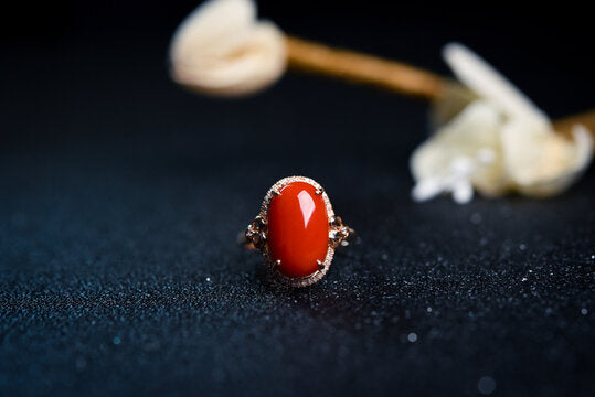 A red coral (moonga stone) ring