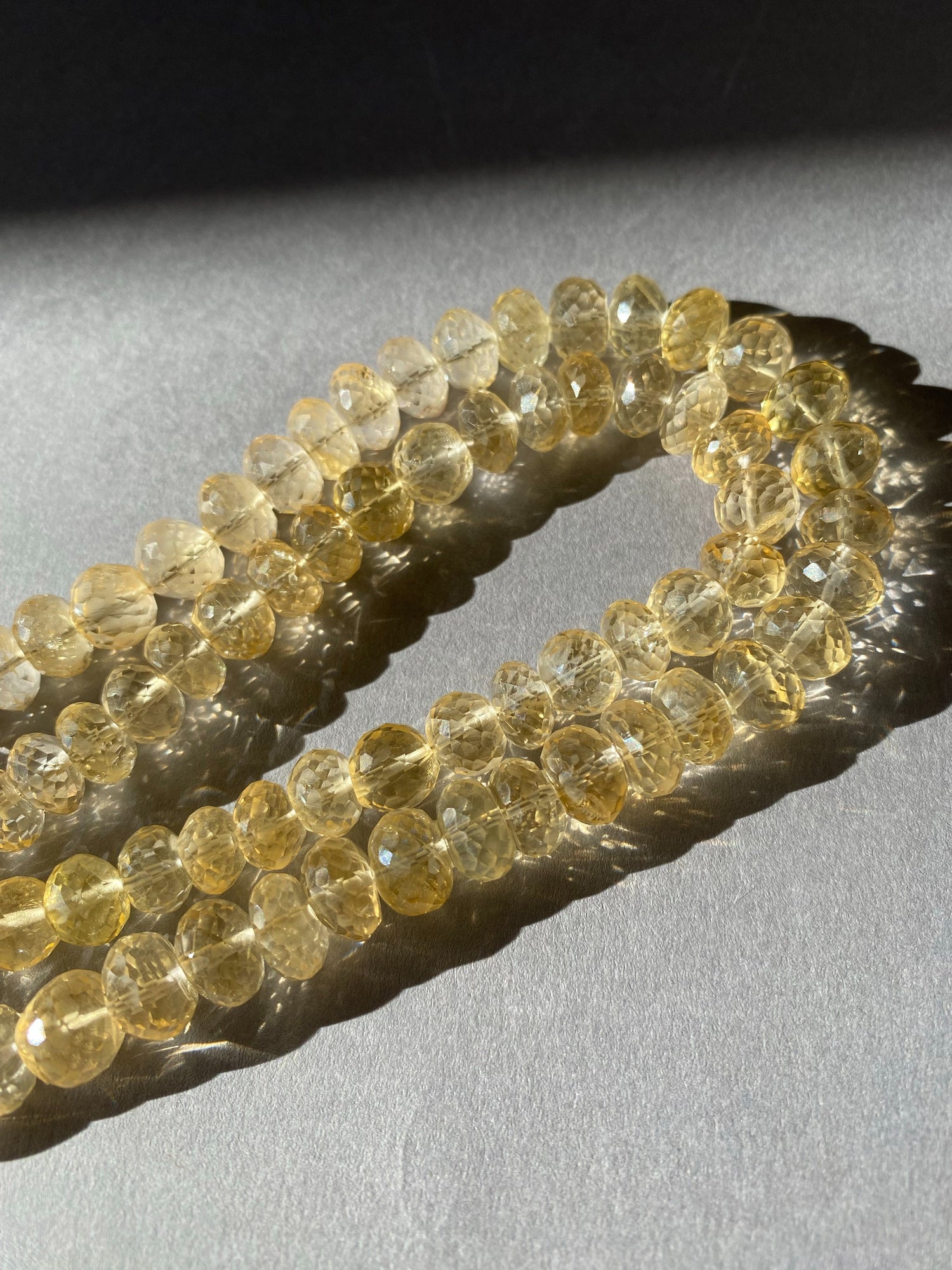 strands of cabochon citrine beads