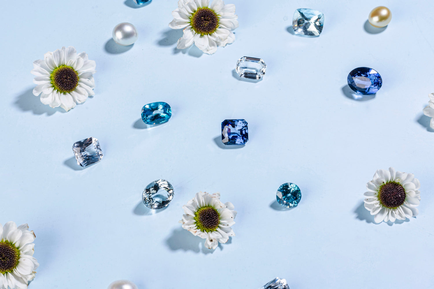 Creative banner image of gemstones and flowers