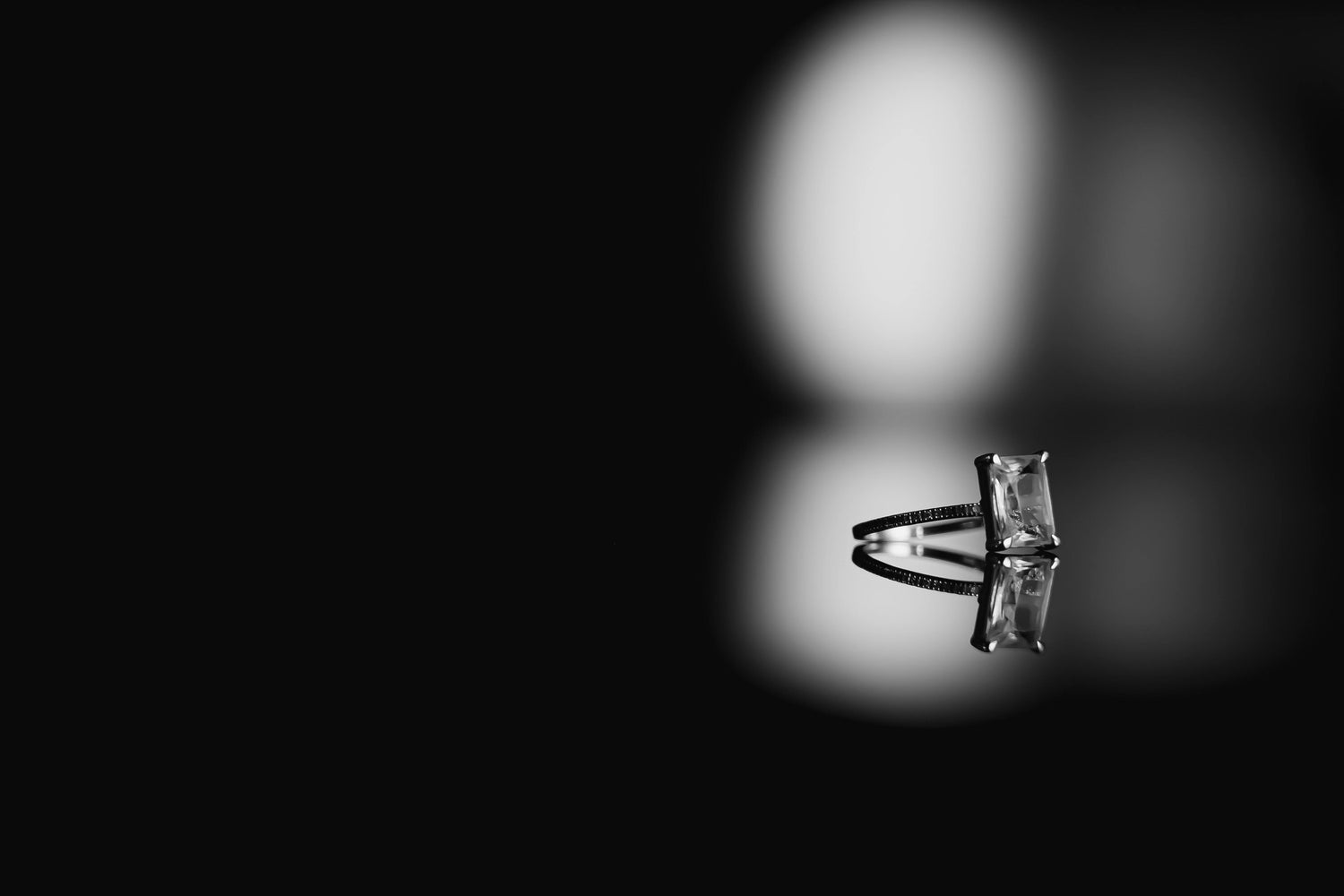 Black and white image of a diamond ring