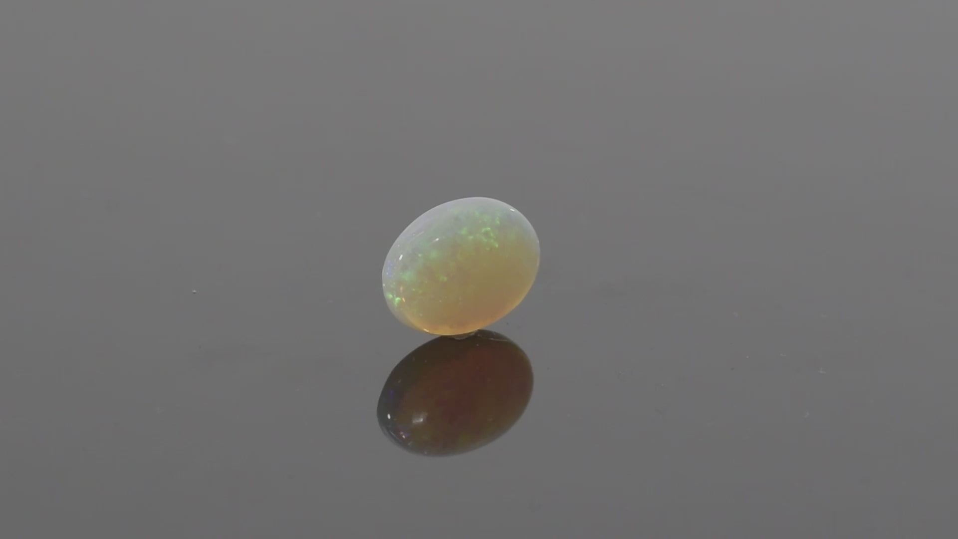 Australian White Opal With Fire - 6.77 Carats