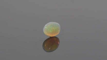 Australian White Opal With Fire - 7.09 Carats