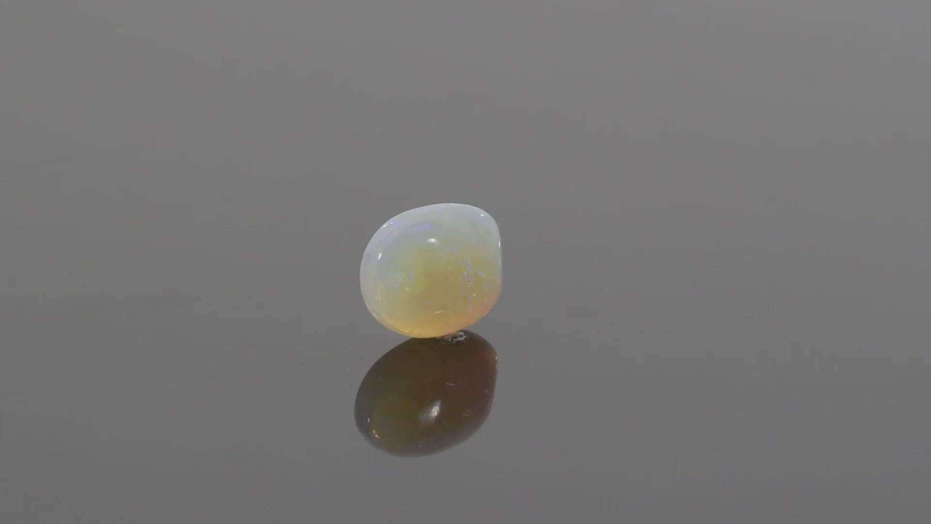 Australian White Opal With Fire - 8.52 Carats